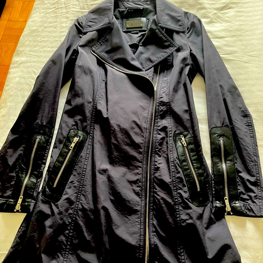 Like new Mackage raincoat dark blue with black leather trimmings.